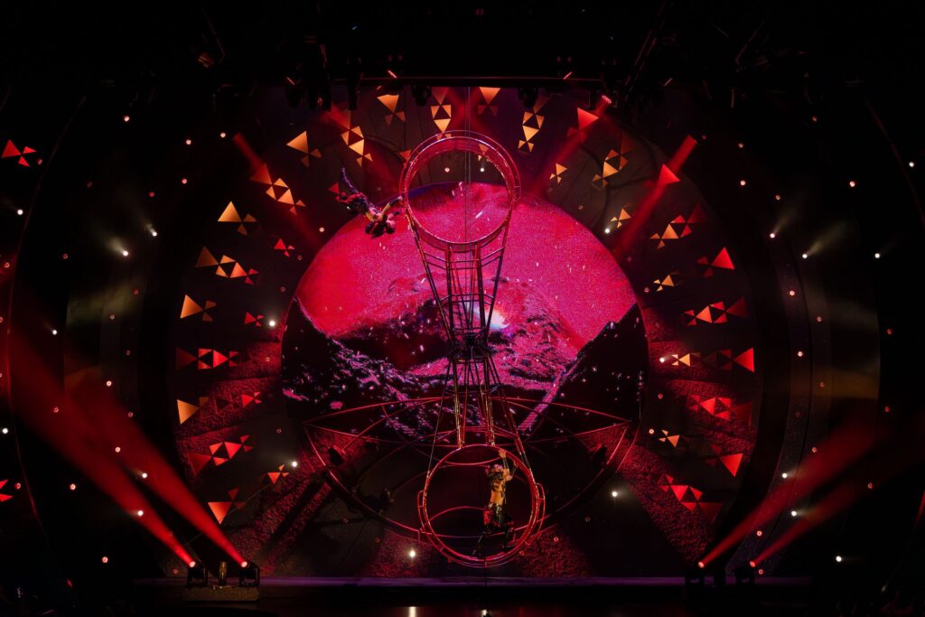 Winged performer onstage during a visually rich moment of Cirque du Soleil’s Auana production.