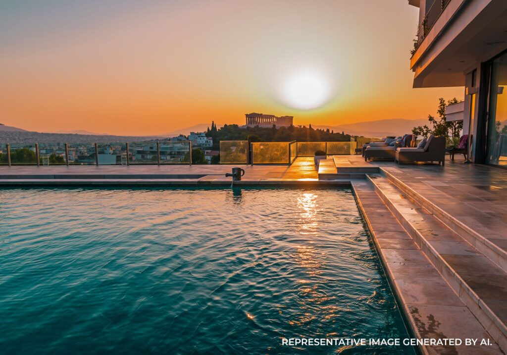 Modern infinity pool with lounge seating and city views in Athens, Greece