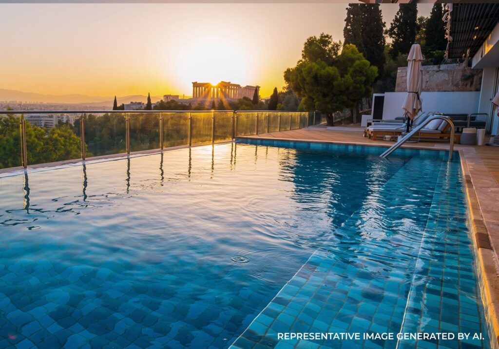 Infinity pool with city views at sunset in Athens, Greece