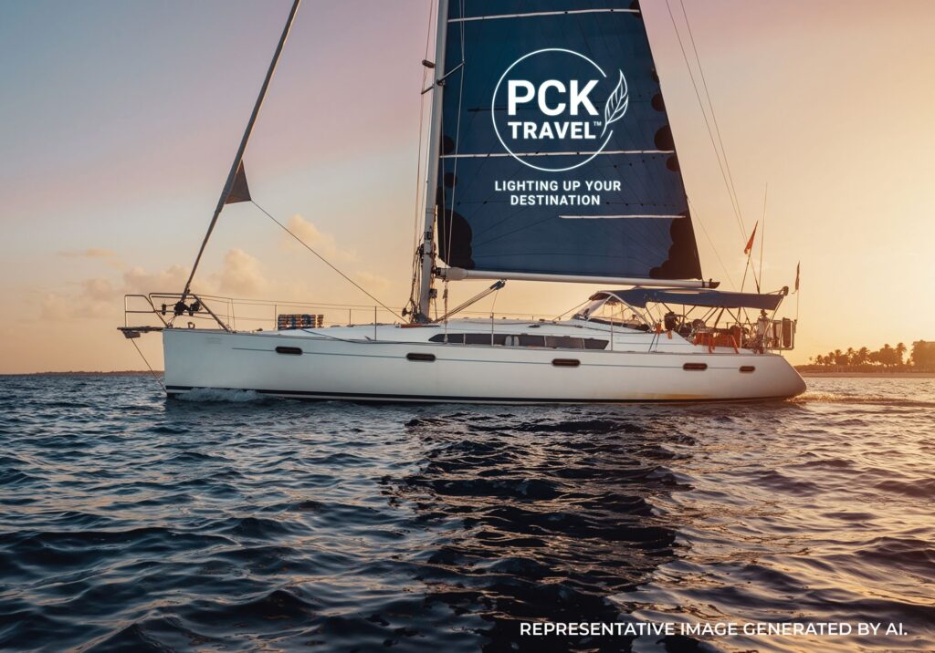 Catamaran cruising across calm ocean waters with sunset colors in the Bahamas