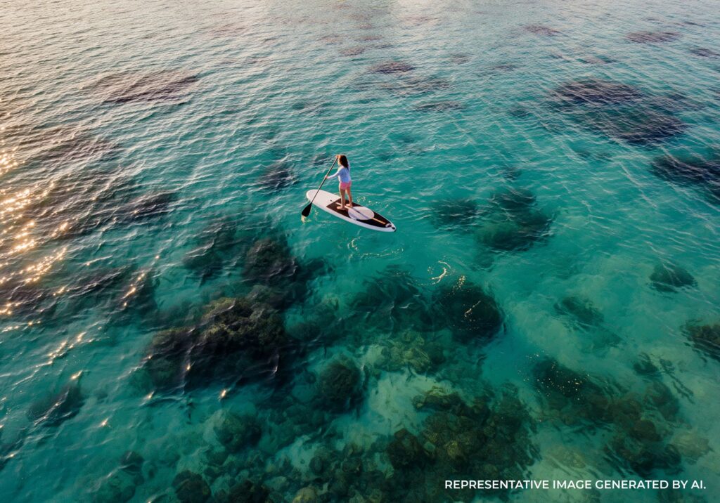 Stand Up Paddleboard Over Coral Reef