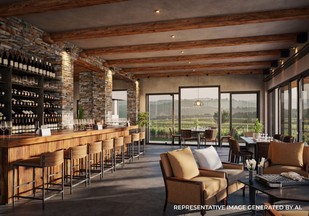 Wood and stone tasting room with wine barrels and soft warm lighting