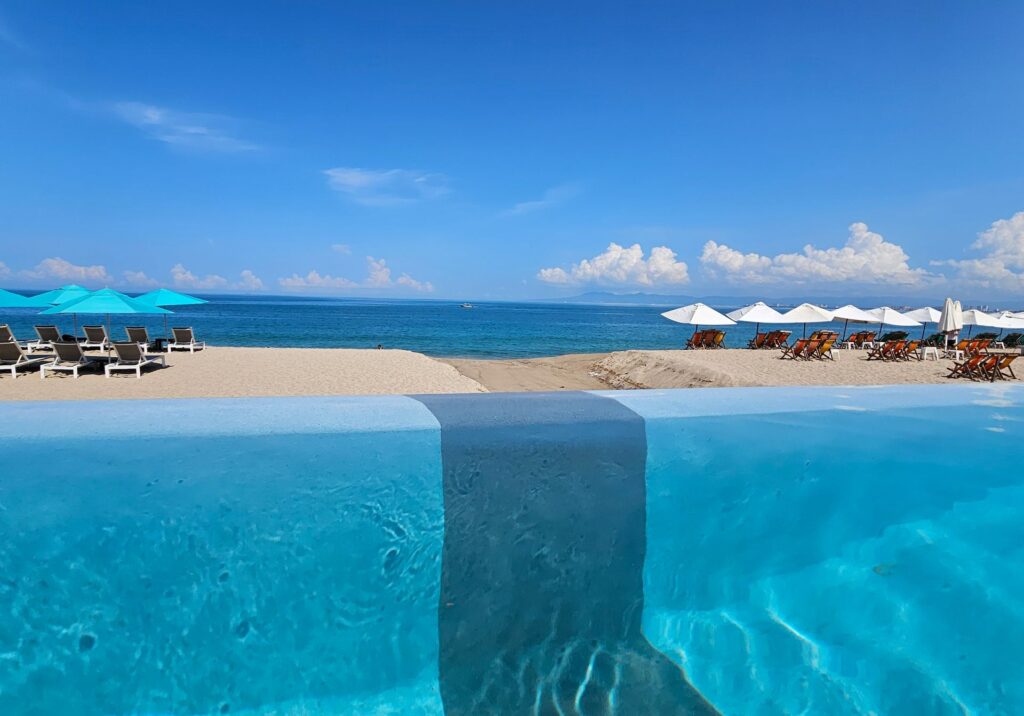 A stunning infinity pool offers uninterrupted ocean views, creating a serene and luxurious escape in Puerto Vallarta.
