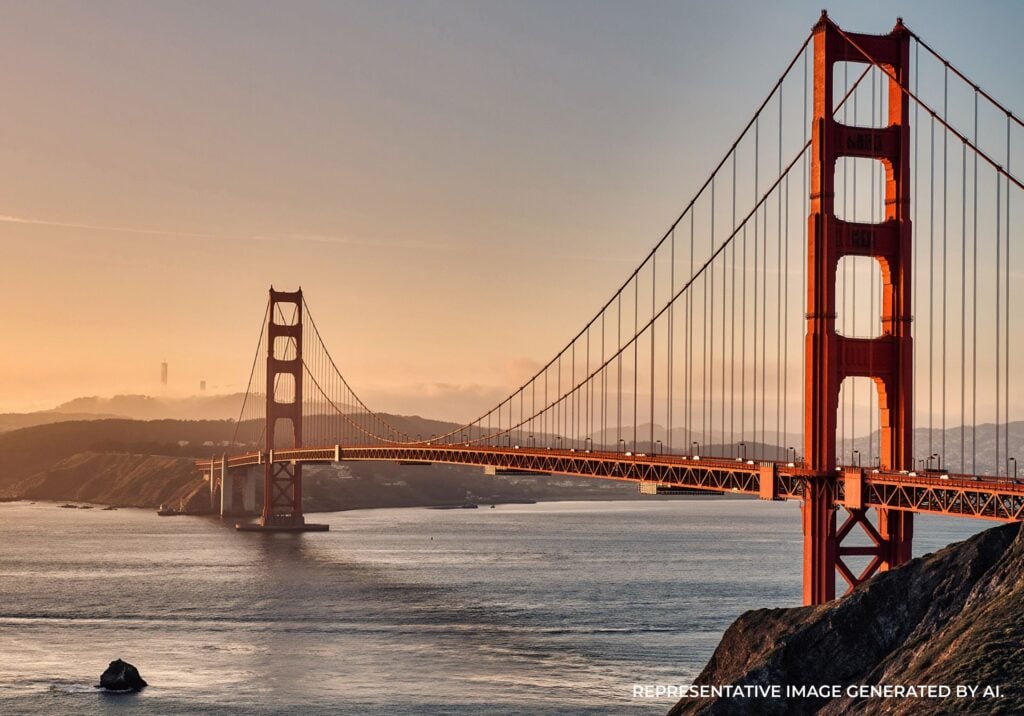 Sunset behind the Golden Gate Bridge overlooking the bay
