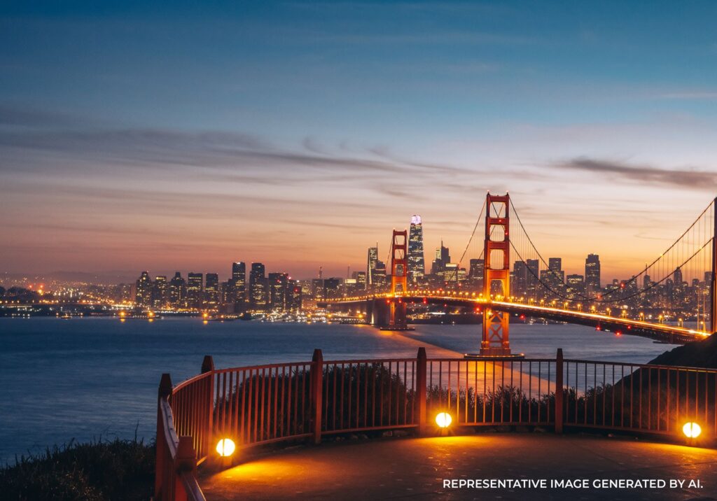 Twilight view of the Golden Gate Bridge over calm water.