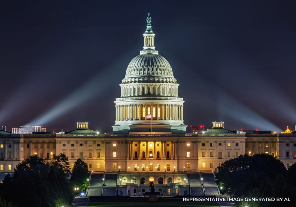 Panoramic night view of the U.S. Capitol Building with architectural spotlights