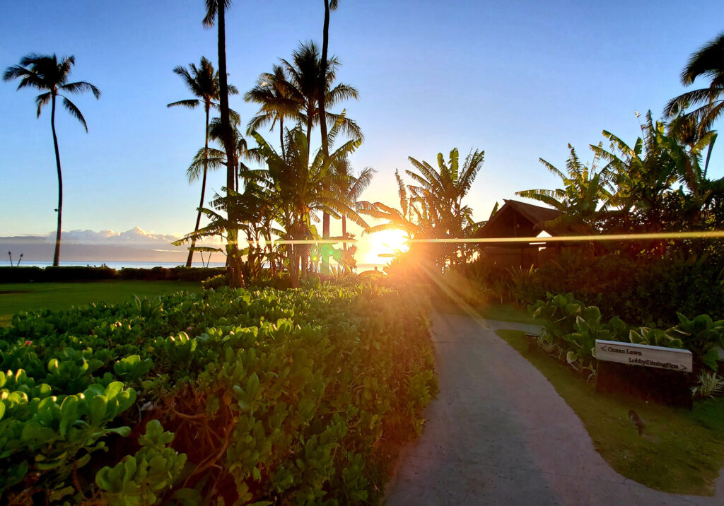 A luxury Maui beach resort at sunset, part of the PCK Travel™ curated collection.
