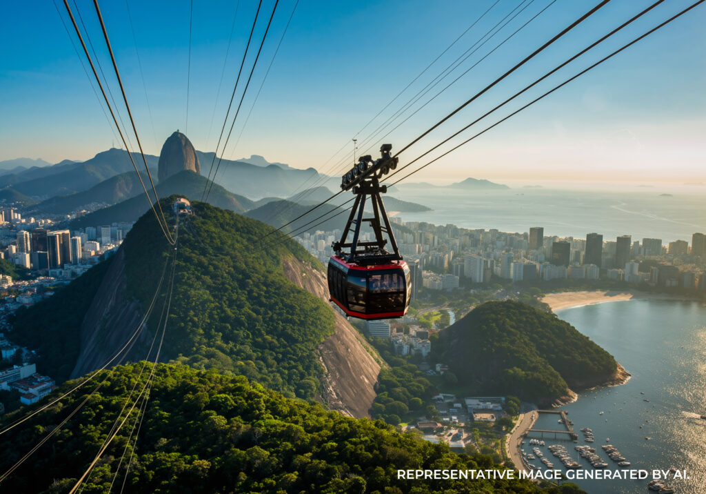 AI generated sunset beach scene in Rio de Janeiro with people walking along the shoreline and mountains silhouetted in the background.