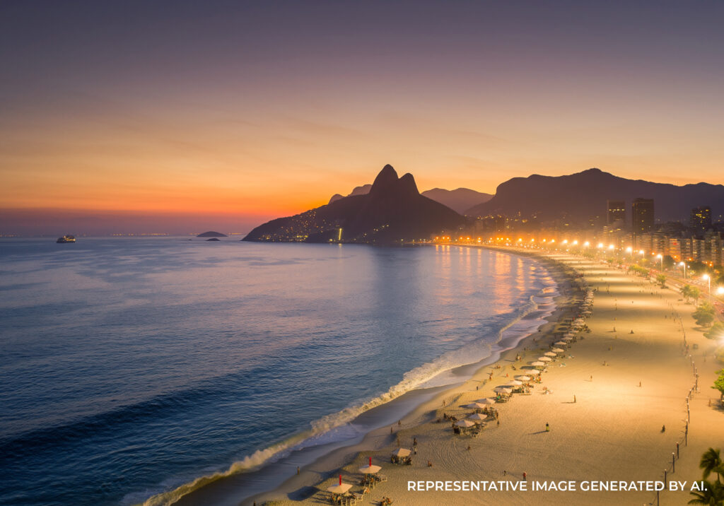 AI generated nighttime coastline in Rio de Janeiro with illuminated shoreline, calm ocean, and a glowing city skyline.