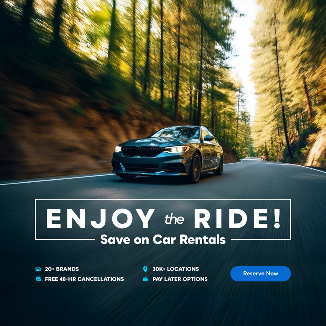 Vehicle driving through scenic landscape symbolizing member rental car savings