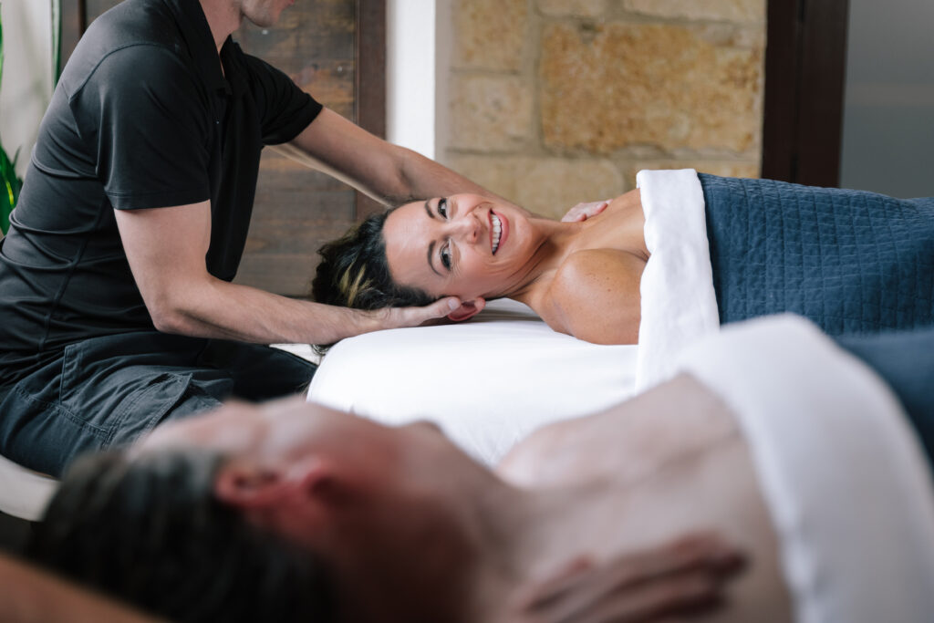Guest receiving massage treatment in a calm spa environment