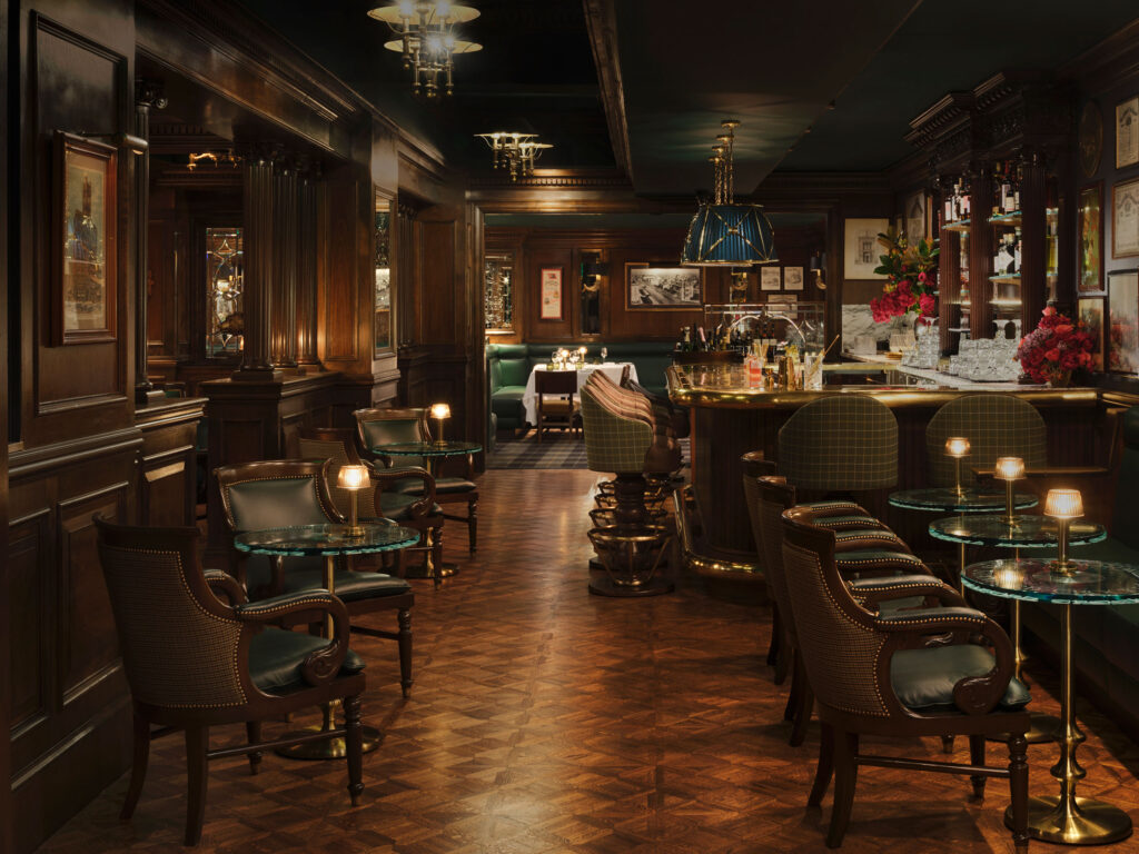 Restaurant dining room at The Huntington Hotel with warm lighting and elegant seating