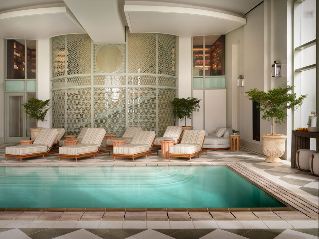 Indoor spa pool and lounge chairs at The Huntington Hotel wellness area