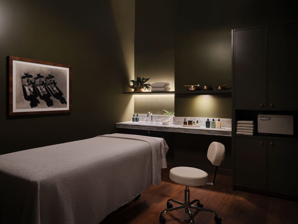 Private spa treatment room at The Huntington Hotel with massage table