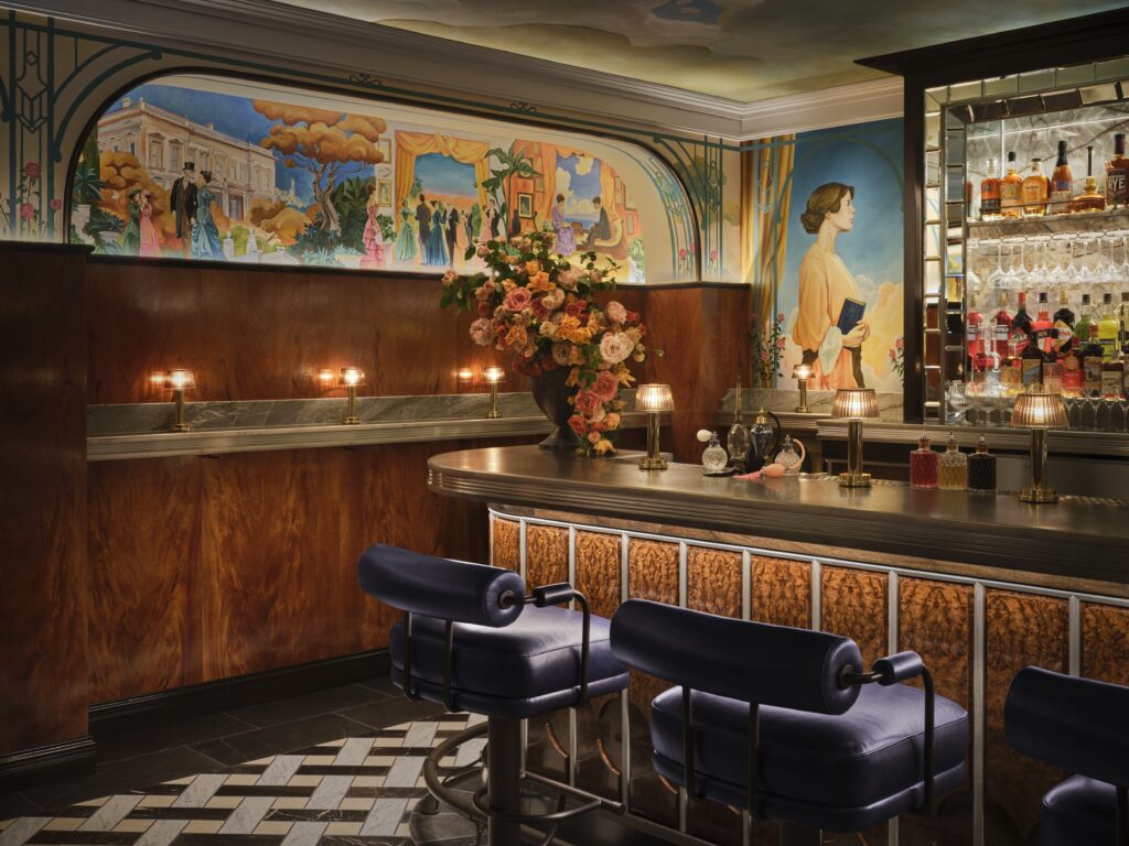 Hotel bar interior at The Huntington Hotel with rich wood and ambient lighting