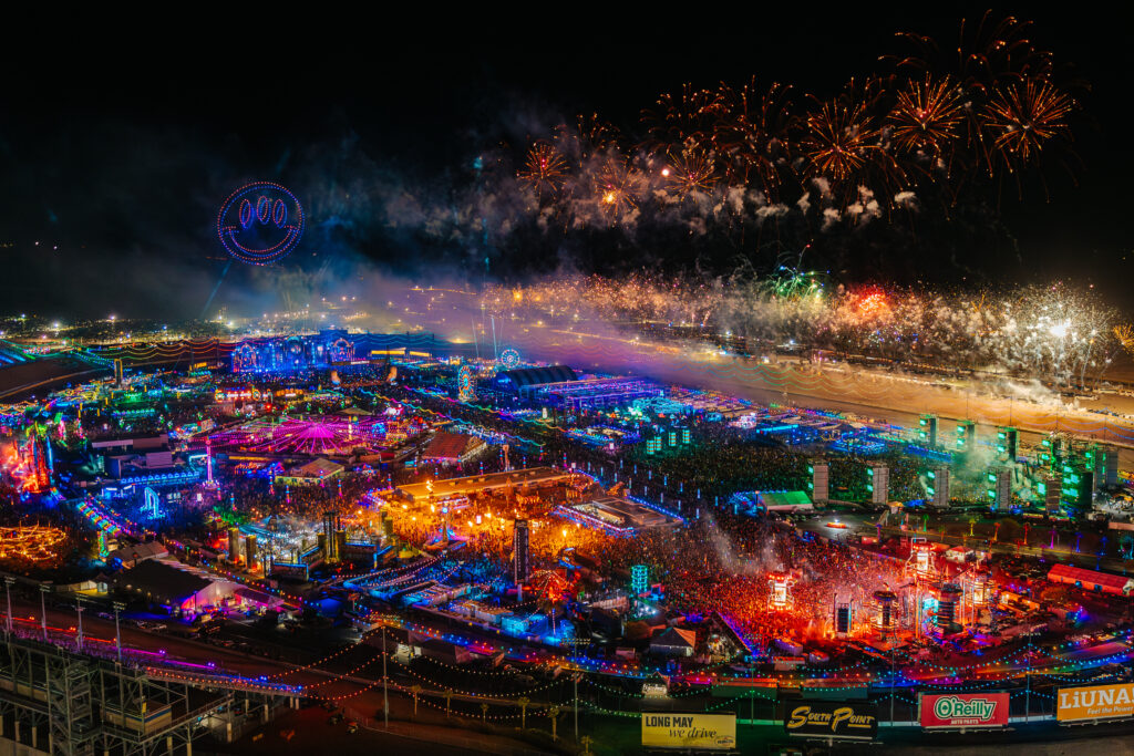 Aerial view of Electric Daisy Carnival Las Vegas with lights and multiple stages