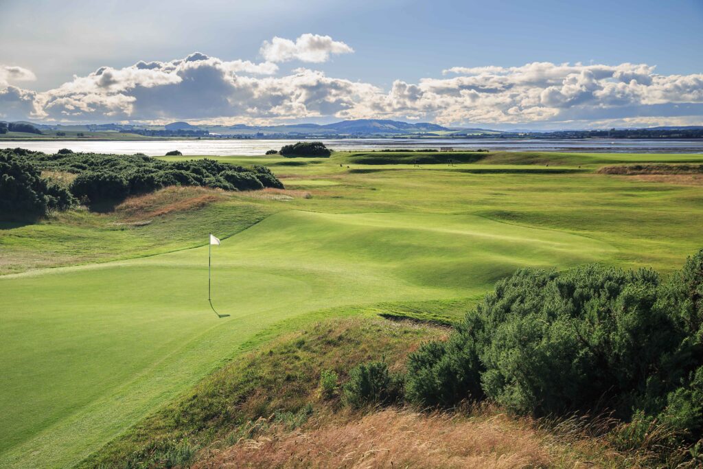 Eden Course Hole 5 at St. Andrews with open fairways and coastal landscape.