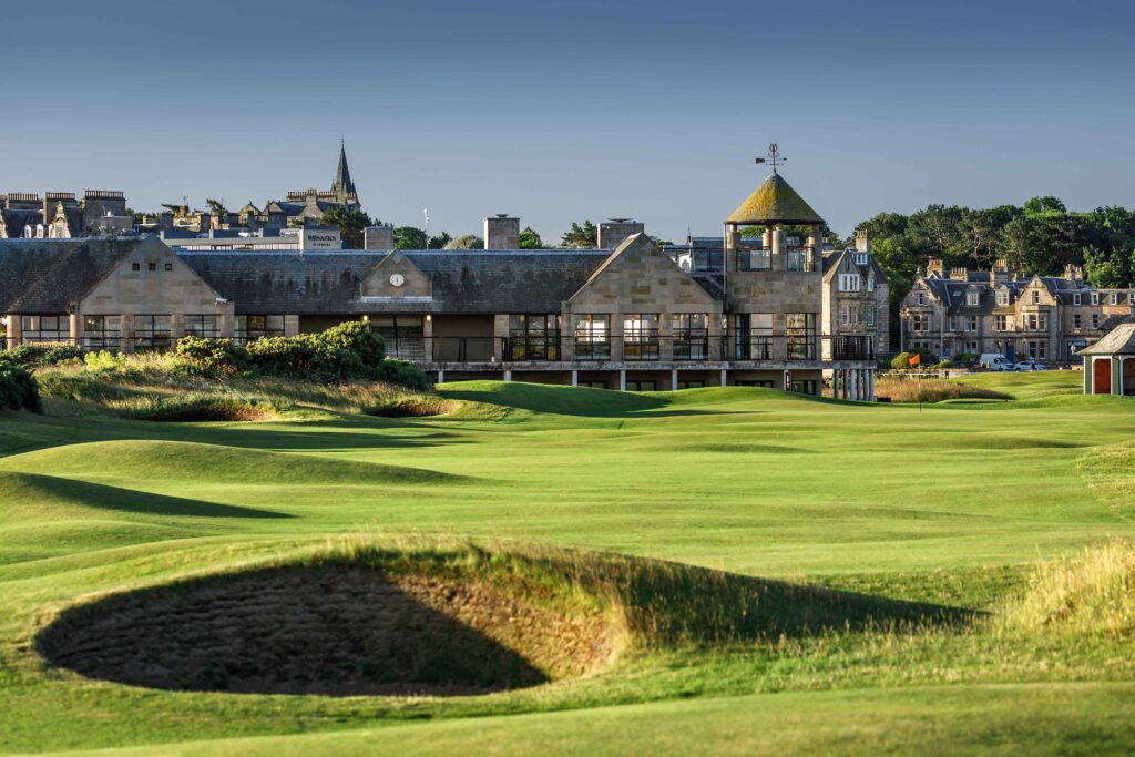 New Course Hole 18 at St. Andrews with clubhouse in the background and classic links layout.
