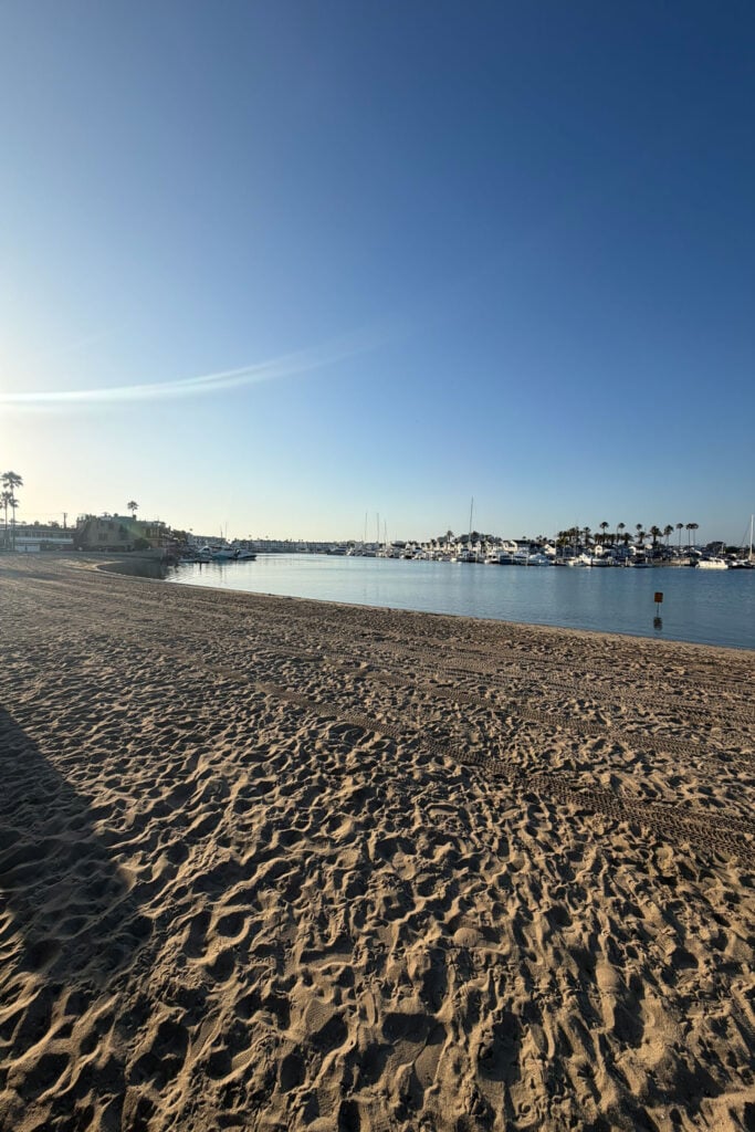 Sunny beach and marina view in Newport Beach, California